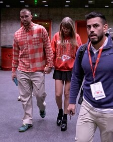 Kansas City Chiefs tight end Travis Kelce, left, and singer Taylor Swift leave Arrowhead stadium after an NFL football game between the Chiefs and the Los Angeles Chargers, Sunday, Oct. 22, 2023, in Kansas City, Mo. (AP Photo/Charlie Riedel) (AP) Kansas City Chiefs tight end Travis Kelce, left, and singer Taylor Swift leave Arrowhead stadium after an NFL football game between the Chiefs and the Los Angeles Chargers, Sunday, Oct. 22, 2023, in Kansas City, Mo. (AP Photo/Charlie Riedel) (AP)