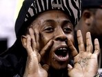 Rapper Lil Wayne shouts during the second half of Game 5 between the Boston Celtics and Miami Heat in their NBA basketball Eastern Conference finals playoffs series in Miami. (AP/Lynne Sladky) Rapper Lil Wayne shouts during the second half of Game 5 between the Boston Celtics and Miami Heat in their NBA basketball Eastern Conference finals playoffs series in Miami. (AP/Lynne Sladky)