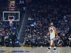 Stephen Curry looks on during the NBA preseason game between the San Antonio Spurs and Golden State Warriors.