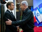 Israeli Prime Minister Benjamin Netanyahu (right) greets French President Emmanuel Macron in Jerusalem on October 24. Israeli Prime Minister Benjamin Netanyahu (right) greets French President Emmanuel Macron in Jerusalem on October 24.