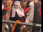 Duo dresses as The Nun and performing Garba. 