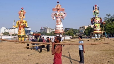 Workers are busy preparing the KP ground for the symbolic burning of Ravan (Ravan Dahan) on the eve of Dussehra in Nagpur. Colourful and gigantic effigies of the demon king Ravana, his brother Kumbhkaran and his son Meghnad have been installed for the occasion. (ANI Photo/Snehal Sontakke) Workers are busy preparing the KP ground for the symbolic burning of Ravan (Ravan Dahan) on the eve of Dussehra in Nagpur. Colourful and gigantic effigies of the demon king Ravana, his brother Kumbhkaran and his son Meghnad have been installed for the occasion. (ANI Photo/Snehal Sontakke)