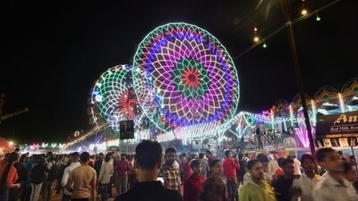A bustling crowd enjoys the carnival, with food stalls and swings, on the day before the Dussehra festival at the at Red Fort, Delhi. (ANI Photo/Rahul Singh) A bustling crowd enjoys the carnival, with food stalls and swings, on the day before the Dussehra festival at the at Red Fort, Delhi. (ANI Photo/Rahul Singh)