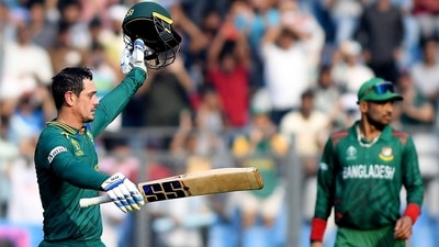 South Africa's Quinton de Kock raises his bat as he celebrates his century during their match against Bangladesh (ANI  )