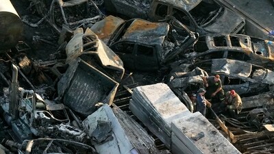 In this aerial photo, responders are seen near wreckage in the aftermath of a multi-vehicle pileup on I-55 in Manchac, La., Monday, Oct. 23, 2023. A “superfog” of smoke from south Louisiana marsh fires and dense morning fog caused multiple traffic crashes involving scores of cars. (AP Photo/Gerald Herbert) (AP) In this aerial photo, responders are seen near wreckage in the aftermath of a multi-vehicle pileup on I-55 in Manchac, La., Monday, Oct. 23, 2023. A “superfog” of smoke from south Louisiana marsh fires and dense morning fog caused multiple traffic crashes involving scores of cars. (AP Photo/Gerald Herbert) (AP)
