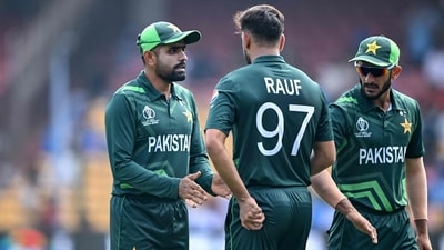 Pakistan's captain Babar Azam (L) talks with his teammate Haris Rauf. (AFP) Pakistan's captain Babar Azam (L) talks with his teammate Haris Rauf. (AFP)