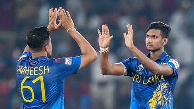 Sri Lanka's Matheesha Pathirana (R) celebrates with teammate after taking the wicket of Pakistan's Abdullah Shafique (AFP)