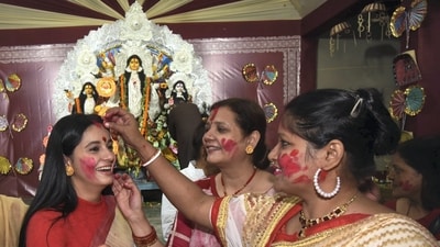 In this picture, a group of women from Patna can be seen participating in the ritual of Sindoor Khela on the last day of Durga Puja, Vijayadashami. (PTI) In this picture, a group of women from Patna can be seen participating in the ritual of Sindoor Khela on the last day of Durga Puja, Vijayadashami. (PTI)