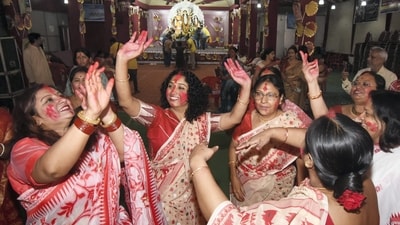 The ritual of Sindoor Khela dates back to around 400 years. Women in West Bengal and Bangladesh started the tradition. After this, it soon reached other parts of India and is now an essential part of the Vijayadashmi celebration. (PTI) The ritual of Sindoor Khela dates back to around 400 years. Women in West Bengal and Bangladesh started the tradition. After this, it soon reached other parts of India and is now an essential part of the Vijayadashmi celebration. (PTI)