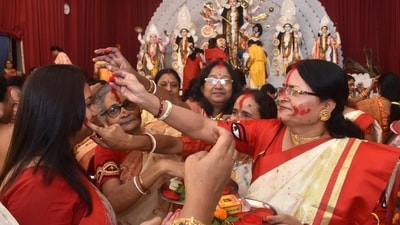 Women in Ranchi apply vermillion on each other as they participate in Sindoor Khela on Vijayadashami, the last day of Durga Puja festival celebrations. (PTI) Women in Ranchi apply vermillion on each other as they participate in Sindoor Khela on Vijayadashami, the last day of Durga Puja festival celebrations. (PTI)