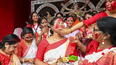 Devotees of Maa Durga celebrate the last day of Durga Puja - Vijayadashami - with pomp. This year, it falls on October 24. People bid audie to Goddess Shakti on this day by immersing her idols in holy water bodies. Another significant ritual of this day is Sindoor Khela, where married women in Bengal smear each other with sindur or vermillion and pray for the long lives of their husbands. Today, women across the country are performing the ritual and here are some snippets from different parts of the country. (PTI) Devotees of Maa Durga celebrate the last day of Durga Puja - Vijayadashami - with pomp. This year, it falls on October 24. People bid audie to Goddess Shakti on this day by immersing her idols in holy water bodies. Another significant ritual of this day is Sindoor Khela, where married women in Bengal smear each other with sindur or vermillion and pray for the long lives of their husbands. Today, women across the country are performing the ritual and here are some snippets from different parts of the country. (PTI)