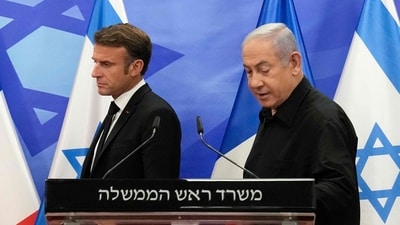 Israeli Prime Minister Benjamin Netanyahu (R) and French President Emmanuel Macron (L) arrive to hold a joint press conference in Jerusalem on October 24, 2023. (AFP) Israeli Prime Minister Benjamin Netanyahu (R) and French President Emmanuel Macron (L) arrive to hold a joint press conference in Jerusalem on October 24, 2023. (AFP)