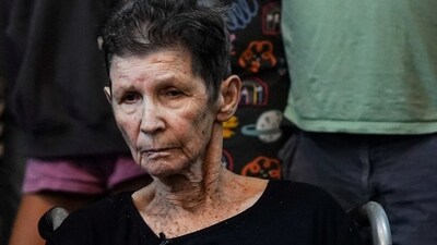 Israel-Hamas War: Yocheved Lifshitz, 85, an Israeli grandmother who was held hostage in Gaza looks on after being released by Hamas militants, at Ichilov Hospital in Tel Aviv. (Reuters)