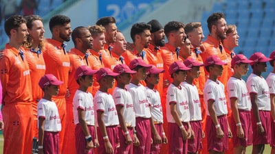 Players stand for the national anthem before the start of the ICC Men's Cricket World Cup 2023 match between Sri Lanka and Netherlands (PTI)