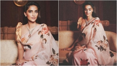 Sonam paired the saree with a silk blouse in a striking golden shade. The contrasting choli features puffed half-length sleeves, a wide plunging neckline, a fitted bust, and a cropped silhouette. A statement silver necklace, matching rings, and dainty earrings completed the accessories with the ensemble.&nbsp; (Instagram)