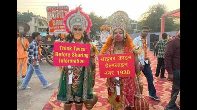 Visiting various Ramlila venues, Chandigarh Police teams asked artistes playing different characters to hold up awareness placards to caution gathered crowds against cyber frauds. (HT Photo) Visiting various Ramlila venues, Chandigarh Police teams asked artistes playing different characters to hold up awareness placards to caution gathered crowds against cyber frauds. (HT Photo)