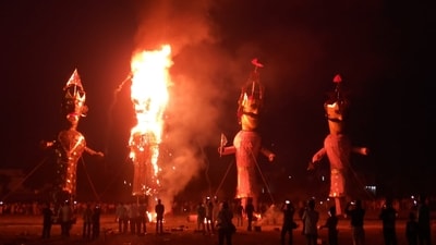 People watch the effigies of Ravana, Meghanad, and Kumbhakaran go up in flames during the Dussehra celebrations in Bathinda on Tuesday. (Sanjeev Kumar) People watch the effigies of Ravana, Meghanad, and Kumbhakaran go up in flames during the Dussehra celebrations in Bathinda on Tuesday. (Sanjeev Kumar)