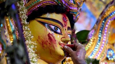 Women offer sindoor to Goddess Durga, before the idol is taken for immersion on the occasion of Vijayadashami on Tuesday, at Kali Bari Mandir Sector 26 , in Noida. (Sunil Ghosh /HT Photo)