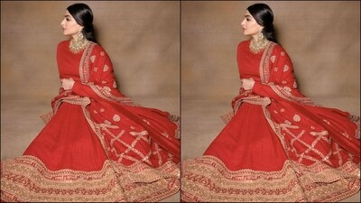 Assisted by her fashion stylist sister Rhea Kapoor, Sonam accessorised her ethnic look with Indian jewellery, including a gold choker necklace, a pair of statement jhumkas and a statement ring adorning her finger. (Instagram/@sonamkapoor) Assisted by her fashion stylist sister Rhea Kapoor, Sonam accessorised her ethnic look with Indian jewellery, including a gold choker necklace, a pair of statement jhumkas and a statement ring adorning her finger. (Instagram/@sonamkapoor)