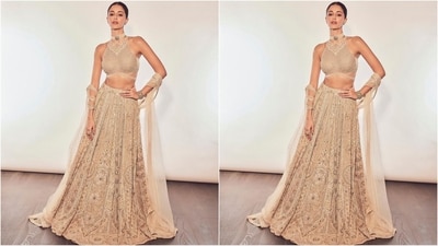 On Tuesday, Ananya's fashion stylist took to Instagram and delighted Ananya's followers with a series of glamorous pictures accompanied by the caption "Dazzling in gold". For her gorgeous look, Ananya donned an exquisite gold lehenga from the shelves of ace fashion designer Tarun Tahiliani. (Instagram/@tanghavri) On Tuesday, Ananya's fashion stylist took to Instagram and delighted Ananya's followers with a series of glamorous pictures accompanied by the caption "Dazzling in gold". For her gorgeous look, Ananya donned an exquisite gold lehenga from the shelves of ace fashion designer Tarun Tahiliani. (Instagram/@tanghavri)