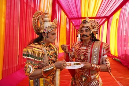 Ram (Malik) and Ravana (Rishi) can't resist relishing a plate of chaat from Purani Dilli. (Photo: Gokul VS/HT)