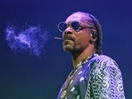 Rapper Snoop Dogg performs during a concert at Lanxess Arena, Thursday, Sept. 21, 2023, in Cologne, Germany. (Henning Kaiser/dpa via AP) Rapper Snoop Dogg performs during a concert at Lanxess Arena, Thursday, Sept. 21, 2023, in Cologne, Germany. (Henning Kaiser/dpa via AP)