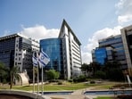 Israeli national flags flutter at a business park housing high tech companies, at Ofer Park in Petah Tikva.