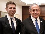 Israeli Prime Minister Benjamin Netanyahu, second from left, and son Yair, left, pose for a photo in Tel Aviv. Israeli Prime Minister Benjamin Netanyahu, second from left, and son Yair, left, pose for a photo in Tel Aviv.