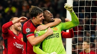 Manchester United's goalkeeper Andre Onana, right, celebrates with teammates after makes a save penalty shoot during the Champions League group A soccer match between Manchester United and Copenhagen (AP) Manchester United's goalkeeper Andre Onana, right, celebrates with teammates after makes a save penalty shoot during the Champions League group A soccer match between Manchester United and Copenhagen (AP)