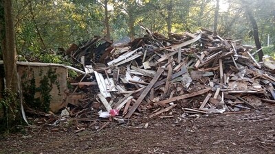 In this photo provided by Susan Hodgson, her mistakenly demolished family home sits in a pile of lumber and debris in southwest Atlanta, Georgia, on Sept. 15, 2023. (Susan Hodgson via AP) (AP) In this photo provided by Susan Hodgson, her mistakenly demolished family home sits in a pile of lumber and debris in southwest Atlanta, Georgia, on Sept. 15, 2023. (Susan Hodgson via AP) (AP)