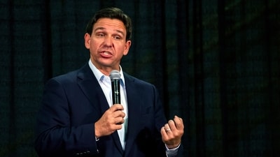 Florida Gov. Ron DeSantis speaks during U.S. Rep. Mariannette Miller-Meeks', R-Iowa, Triple MMM Tailgate event in Iowa City, Iowa on Friday, Oct. 20, 2023. The event featured remarks from several candidates for the Republican Party's nomination for President. (Nick Rohlman/The Gazette via AP) (AP) Florida Gov. Ron DeSantis speaks during U.S. Rep. Mariannette Miller-Meeks', R-Iowa, Triple MMM Tailgate event in Iowa City, Iowa on Friday, Oct. 20, 2023. The event featured remarks from several candidates for the Republican Party's nomination for President. (Nick Rohlman/The Gazette via AP) (AP)
