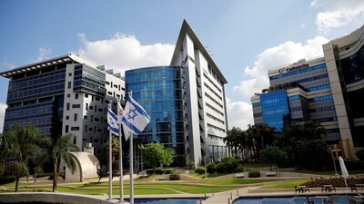 Israeli national flags flutter at a business park housing high tech companies, at Ofer Park in Petah Tikva. (REUTERS)