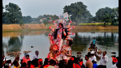 Immersion of Goddess Durga at Andawa in Prayagraj on Tuesday. (Anil Kumar Maurya/HT) Immersion of Goddess Durga at Andawa in Prayagraj on Tuesday. (Anil Kumar Maurya/HT)