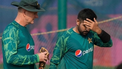 Pakistan's captain Babar Azam reacts as he speaks with batting coach Grant Bradburn during a practice session ahead of the ICC Men's Cricket World Cup match (AP) Pakistan's captain Babar Azam reacts as he speaks with batting coach Grant Bradburn during a practice session ahead of the ICC Men's Cricket World Cup match (AP)