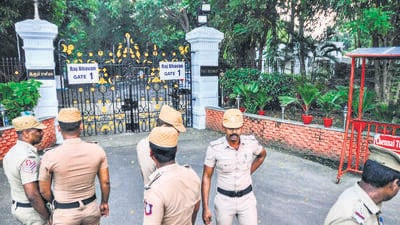 Police personnel outside the Raj Bhawan after the bomb was hurled in Chennai on Wednesday. (PTI) Police personnel outside the Raj Bhawan after the bomb was hurled in Chennai on Wednesday. (PTI)