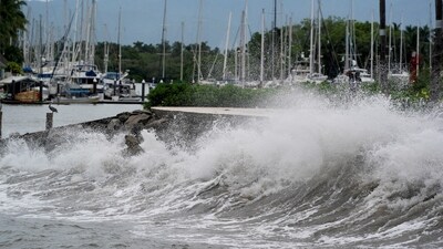 Waves crash against an ocean pier as Hurricane barrels towards Mexico's Pacific coast (REUTERS)