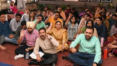 Teachers raising slogans during the protest at DAV College, Sector 10, Chandigarh on Wednesday.. (Keshav Singh/HT)