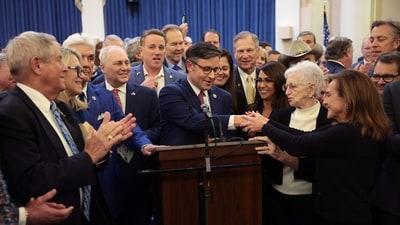 WASHINGTON, DC - OCTOBER 24: U.S. Rep. Mike Johnson (R-LA) surrounded by House Republicans speaks after he was elected as the speaker nominee during a GOP conference meeting in the Longworth House Office Building on Capitol Hill on October 24, 2023 in Washington, DC. The conference was meeting in a closed-door session to select a successor to ousted Speaker Kevin McCarthy (R-CA), who was removed on October 4 in a move led by a small group of conservative members of his own party.   Win McNamee/Getty Images/AFP (Photo by WIN MCNAMEE / GETTY IMAGES NORTH AMERICA / Getty Images via AFP) (Getty Images via AFP)