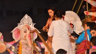 Rani Mukerji is seen worshipping the idol of Lord Ganesha during the Sindoor Khela, the last day of the Durga Puja celebrations. She applied sindoor on the dieties and performed other rituals during the function. Rani Mukerji is seen worshipping the idol of Lord Ganesha during the Sindoor Khela, the last day of the Durga Puja celebrations. She applied sindoor on the dieties and performed other rituals during the function. 