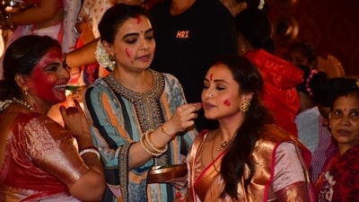 Rani Mukerji was also joined by her sister-in-law Jyoti Mukerji and choreographer Vaibhavi Merchant at the Sindoor Khela on Tuesday. Vaibhavi applied colour on Rani during the festivities. Rani and Jyoti were also seen sharing a long hug while playing Sindoor Khela. Rani Mukerji was also joined by her sister-in-law Jyoti Mukerji and choreographer Vaibhavi Merchant at the Sindoor Khela on Tuesday. Vaibhavi applied colour on Rani during the festivities. Rani and Jyoti were also seen sharing a long hug while playing Sindoor Khela. 