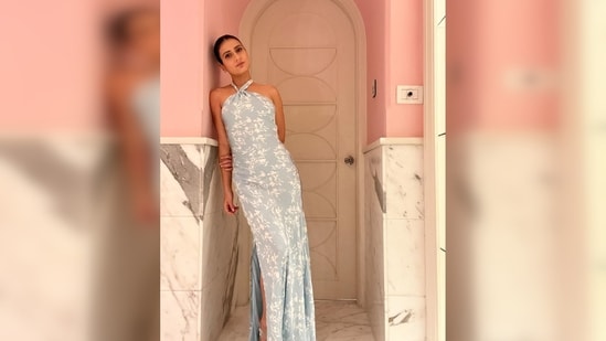 Fatima Sana Shaikh's dress includes a halter neck, a deep open back, and a high side slit, contributing to its elegant design.&nbsp;(Instagram/@fatimasanashaikh)