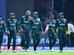 Pakistan's captain Babar Azam (C) along with teammates arrives on ground for the 2023 ICC Men's Cricket World Cup one-day international (ODI) match between Australia and Pakistan at the M. Chinnaswamy Stadium