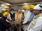 PM Modi being presented the model of Golden Temple PM Modi being presented the model of Golden Temple