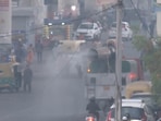 Water was sprinkled through an anti-smog gun in Anand Vihar.