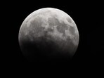 Partial lunar eclipse seen from Parel in Mumbai, India, on Tuesday, August 8. (Satyabrata Tripathy/HT Photo) Partial lunar eclipse seen from Parel in Mumbai, India, on Tuesday, August 8. (Satyabrata Tripathy/HT Photo)