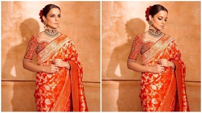 She accessorised her look with Indian jewellery, including a heavy gold choker necklace set with red and green emeralds. With a pair of oversized statement jhumkas, she looked like an elegant princess. (Instagram/@kanganaranaut) She accessorised her look with Indian jewellery, including a heavy gold choker necklace set with red and green emeralds. With a pair of oversized statement jhumkas, she looked like an elegant princess. (Instagram/@kanganaranaut)