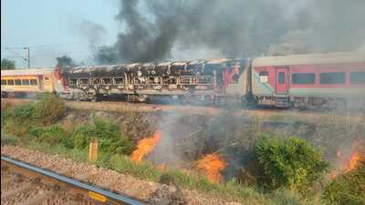 Bogies of Patalkot Express on fire on Wednesday. (HT) Bogies of Patalkot Express on fire on Wednesday. (HT)