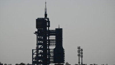 A Long March-2F carrier rocket, carrying the Shenzhou-17 spacecraft and a crew of three astronauts. (AFP) A Long March-2F carrier rocket, carrying the Shenzhou-17 spacecraft and a crew of three astronauts. (AFP)