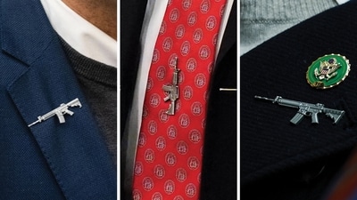 Earlier this year few Republican members of Congress had worn controversial new pins on their lapels in the shape of miniature AR-15 rifles (X) Earlier this year few Republican members of Congress had worn controversial new pins on their lapels in the shape of miniature AR-15 rifles (X)