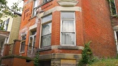 130-year-old house that Betsy Sweeney had bought and renovated (YouTube/@Wheeling Heritage Media) 130-year-old house that Betsy Sweeney had bought and renovated (YouTube/@Wheeling Heritage Media)